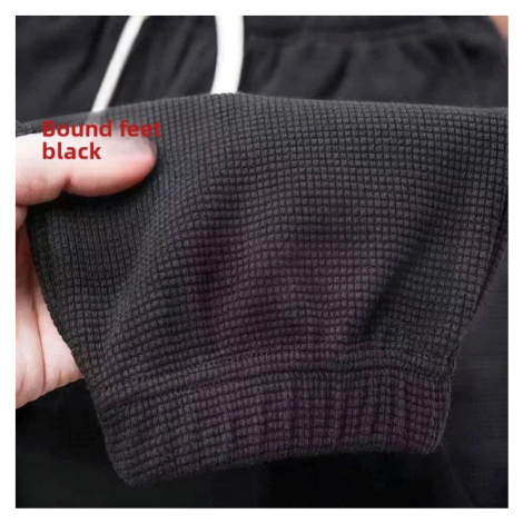 Dámské volné kalhoty s vysokým pasem a vzorem