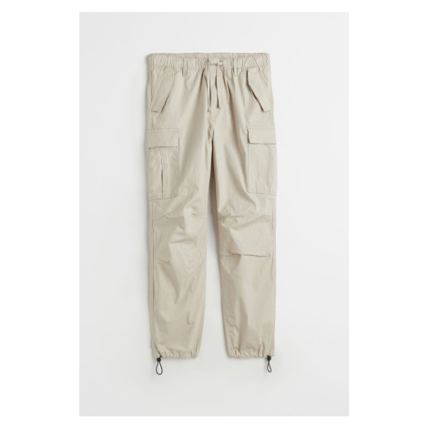 H & M - Kalhoty cargo z tkaniny ripstop Regular Fit - béžová H&M