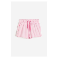 H & M - Bavlněné teplákové šortky - růžová