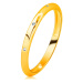 Zlatý prsten ze 14K zlata - tři zirkony čiré barvy, zrcadlově lesklý a hladký povrch