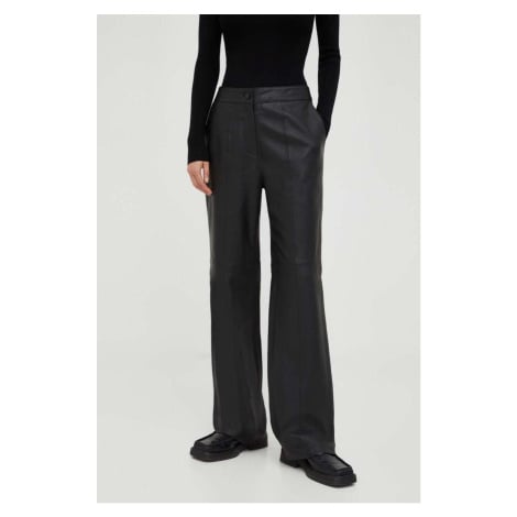 Kožené kalhoty Bruuns Bazaar dámské, černá barva, široké, high waist