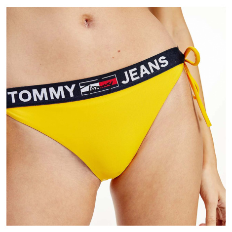 Žlutý spodní díl plavek Tommy Jeans Cheeky String Side Tie Tommy Hilfiger