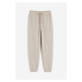 H & M - Teplákové kalhoty z bavlněné směsi - hnědá