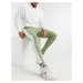 ASOS DESIGN skinny joggers with side stripe in khaki-Green