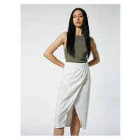 Koton Midi Skirt with Wrapover Closure and Deep Slits.