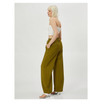 Koton Wide Leg Trousers with Tie Waist Viscose Blend. Textured.