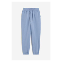 H & M - Teplákové kalhoty z bavlněné směsi - modrá