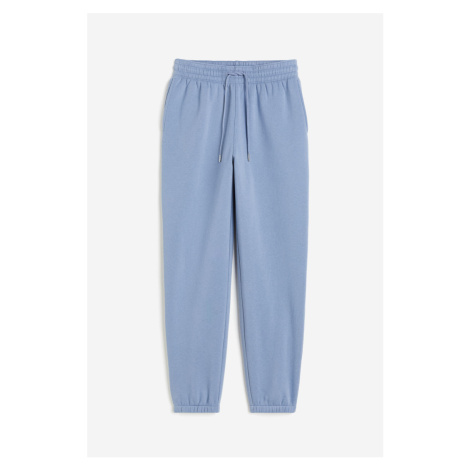 H & M - Teplákové kalhoty z bavlněné směsi - modrá H&M