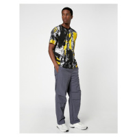 Koton Parachute Trousers with a loose fit, lacing at the waist, and elasticated legs with a pock