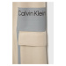 Dětské kalhoty Calvin Klein Jeans béžová barva, s potiskem