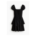 H & M - Šaty's žabkováním a volánovou sukní - černá