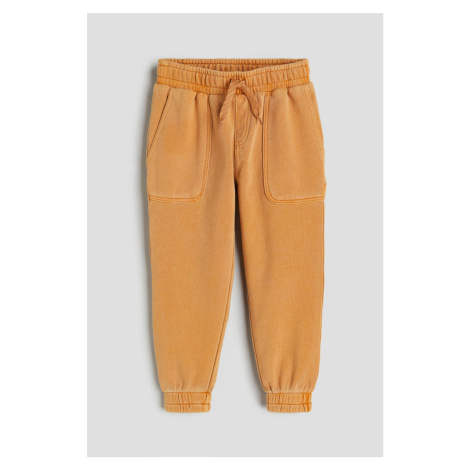 H & M - Kalhoty carpenter jogger - žlutá H&M