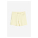 H & M - Sportovní šortky hotpants z materiálu SoftMove™ - žlutá