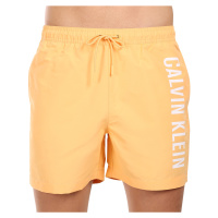 Pánské plavky Calvin Klein oranžové (KM0KM01004-SAN)