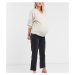 ASOS DESIGN Maternity high rise stretch 'effortless' crop kick flare jeans in black with over th