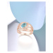 Masivní stříbrný prsten s třpytivými vlny a masivním světle modrým kamenem