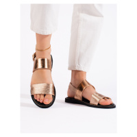 Originální zlaté dámské sandály na plochém podpatku