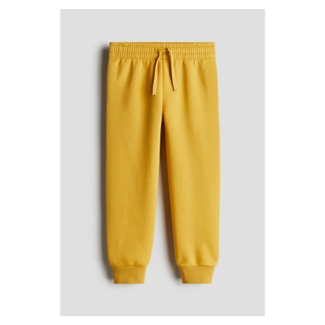 H & M - Kalhoty jogger's česanou vnitřní stranou - žlutá H&M