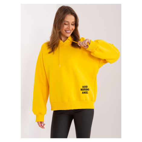 Žlutá zateplená oversize mikina s kapucí a nápisem Fashionhunters