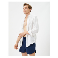 Koton Swimsuit Shorts Short waist with a tie-down pocket.