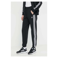 Bavlněné tepláky adidas Originals černá barva, s aplikací, IB7457