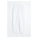 H & M - Teplákové kalhoty z bavlněné směsi - bílá