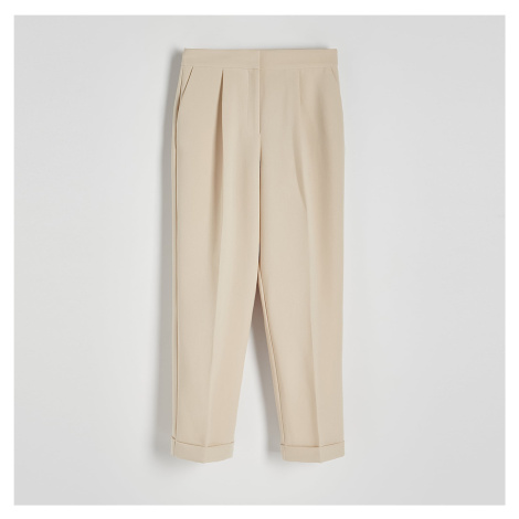 Béžové kalhoty palazzo