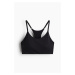 H & M - Sportovní podprsenka Light Support ze SoftMove™ - černá