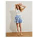 Koton Tiered Mini Skirt with Floral Tassel Detail.
