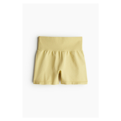 H & M - Bezešvé sportovní hotpants z materiálu DryMove™ - žlutá H&M