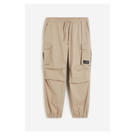 H & M - Bavlněné kalhoty cargo jogger Relaxed Fit - béžová H&M