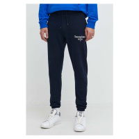 Bavlněné tepláky Tommy Jeans tmavomodrá barva, s potiskem, DM0DM18935