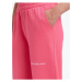 Tmavě růžové dámské tepláky Calvin Klein Jeans