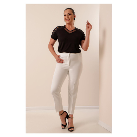 By Saygı Lycra Plus Size Trousers throughout the length with an elasticated waist.