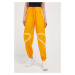 Tréninkové kalhoty adidas by Stella McCartney TruePace oranžová barva, s potiskem
