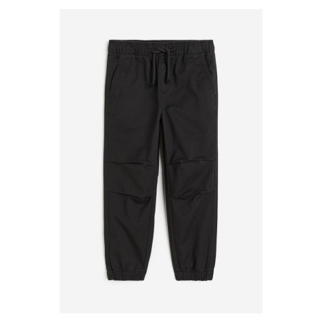 H & M - Keprové kalhoty jogger - černá H&M