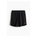 H & M - Elastické sportovní šortky z DryMove™ s kapsami - černá