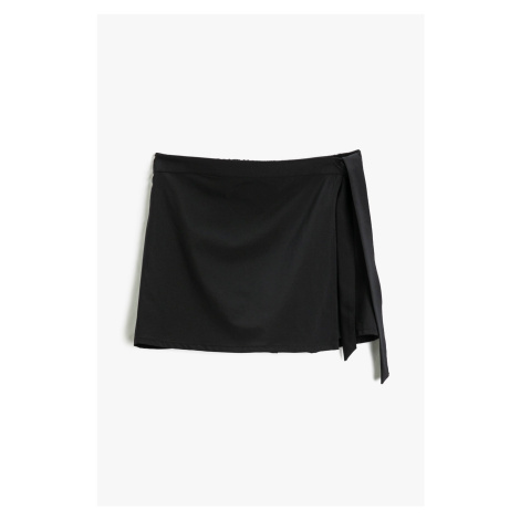 Dámská černá sukně Koton