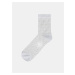 Bílé dámské puntíkované silonkové ponožky Bellinda TRENDY SOCKS