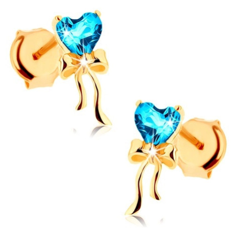 Zlaté náušnice 585 - lesklá mašlička, modré topasové srdíčko Šperky eshop
