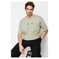 Trendyol Mint Oversize/Wide-Cut Floral-Text Print Short Sleeve 100% Cotton T-Shirt