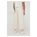 Bavlněné tepláky Calvin Klein Jeans béžová barva, s aplikací, J30J324953