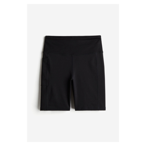 H & M - Sportovní šortky z materiálu DryMove™ s kapsou - černá H&M