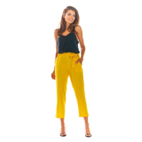 Dámské letní kalhoty s volným střihem ve žluté barvě