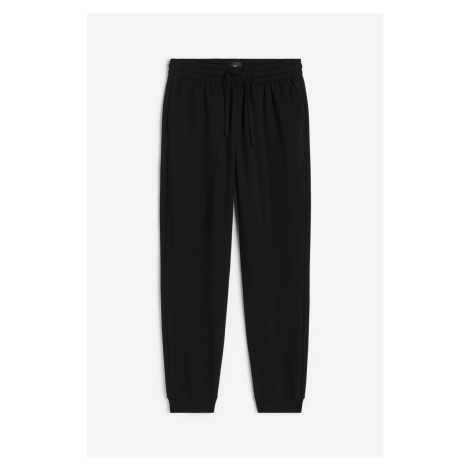 H & M - Teplákové kalhoty Regular Fit - černá H&M