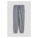 H & M - Kalhoty jogger z bavlněného žerzeje - šedá