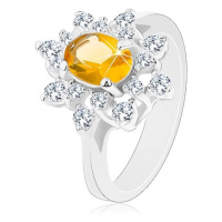 Prsten ve stříbrné barvě, blýskavý květ ze zirkonů žluté a čiré barvy
