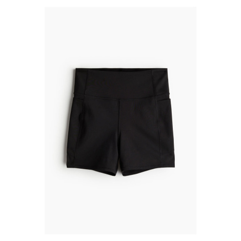 H & M - Sportovní šortky hotpants z DryMove™ s kapsou - černá H&M