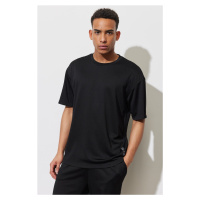 AC&Co / Altınyıldız Classics Men's Black Loose Fit Crew Neck Soft Textured Sports T-Shirt