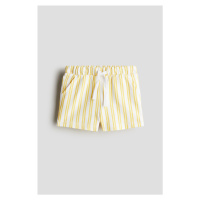H & M - Bavlněné šortky - žlutá